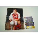 A large signed photograph of Paul Merson, 41cm high, 30.