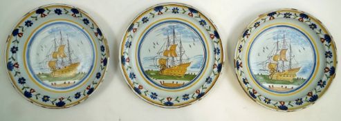 A set of three 19th century Delft plates,
