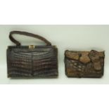 A faux crocodile handbag with loop handle, 29cm wide and an early 20th century alligator clutch bag,