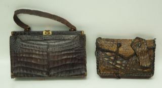A faux crocodile handbag with loop handle, 29cm wide and an early 20th century alligator clutch bag,