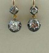 A pair of two stone diamond drop earrings, the old brilliant cut of approximately 0.