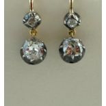 A pair of two stone diamond drop earrings, the old brilliant cut of approximately 0.