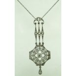 An ornate Art Deco style diamond chandelier pendant, on a chain, the overall length of pendant 5.