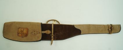 A two tone leather and suede gun slip,