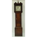 An early 19th century oak cased longcase clock,