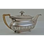 An early 19th century Cantonese teapot by Lynchlong/Linchlong, of rounded rectangular outline,