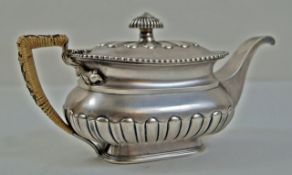 An early 19th century Cantonese teapot by Lynchlong/Linchlong, of rounded rectangular outline,