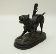 A Victorian spelter figure of a bull terrier chained to a post with a ball between his front paws