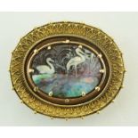 A 19th century gold oval boulder opal cameo brooch,