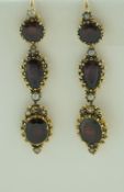 A pair of garnet and seed pearl Victorian style earrings, of three tier drop design, 4.