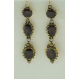 A pair of garnet and seed pearl Victorian style earrings, of three tier drop design, 4.