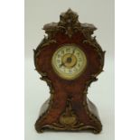A Louis XV style mantel clock with burr walnut veneered case and gilt metal mounts,
