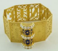 A mid Victorian gold name bracelet, folding into the form of a book,