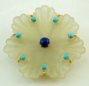 A hardstone carved brooch in the form of a flower, set with turquoise and lapis lazuli,