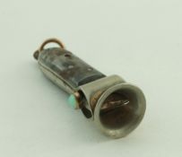 A gun metal cigar cutter, set with opals,