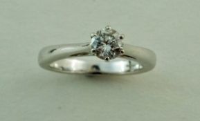 A single stone diamond 18 carat white gold ring, the brilliant cut of approximately 0.