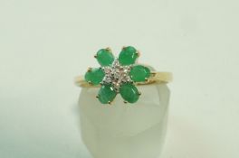 A 9 carat gold emerald and diamond cluster ring, finger size N, 2.