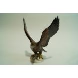 A Beswick golden eagle, impressed marks, 2062, 26.