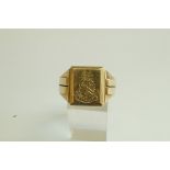 A 9 carat gold signet ring, crested to the rectangular head, finger size V,