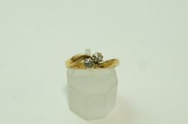 A two stone diamond 18 carat gold ring, Birmingham 1908,