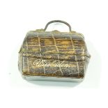 A 19th century travelling inkwell in the form of a Gladstone bag,