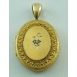 A Victorian silver gilt and diamond locket, circa 1880,