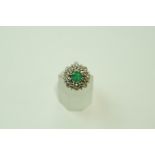 An emerald and single cut diamond cluster ring, stamped '18ct', finger size L, 4.