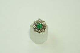An emerald and single cut diamond cluster ring, stamped '18ct', finger size L, 4.