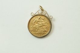 A 1905 gold half sovereign in 9 carat mount