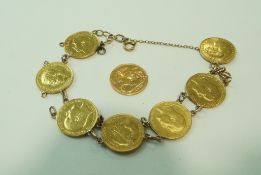 Eight Victorian and Edwardian gold half sovereigns, fashioned into a bracelet,