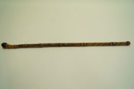 A bamboo walking cane carved in relief with birds and plants, with a silver collar,