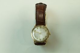 Omega, Geneve, a gentleman's 9 carat gold automatic wrist watch,
