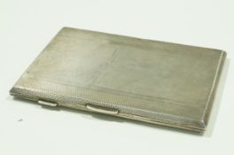 A silver cigarette case, monogrammed and inscribed, 215 g (6.