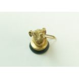 A late Victorian bloodstone seal fob, well modelled as a greyhound's head, with ruby set eyes,