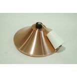 A retro hanging light with coppered finish,