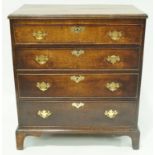 A George III oak and mahogany cross banded chest of four graduated drawers on bracket feet, 97.