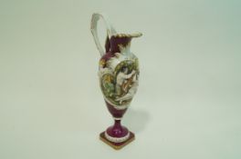A Capodimonte ewer moulded with figures,