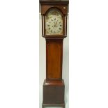 An early 19th century mahogany long case clock, the convex arched painted dial,