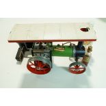 A boxed Mamod traction engine,