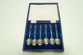 A cased set of six coffee spoons, Australian, set with single opals,