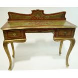 An early 20th century Venetian style dressing table with shaped back and two drawers,