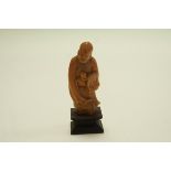 A 20th century carved hardstone figure of a scholar, 11.