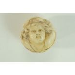 A late 19th century carved ivory ball, probably Dieppe,