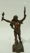 A French spelter figural table lamp patinated in green and bronze, titled Primax, overall 75.