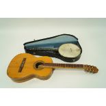 A banjo in fitted case,