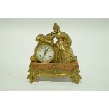 An early 20th century German mantel clock with enamel dial, brass and marble case, 34cm high,