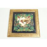 A Moorcroft trial tile, tubelined with a robin amongst holly, framed, impressed and painted marks,