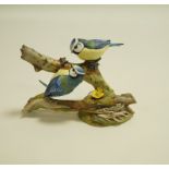 A Coalport figure of blue tits on a branch, printed factory marks, number 433 out of 750,