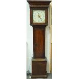 An early 19th century oak longcase clock with square painted dial and date aperture,