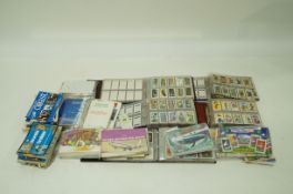 A large collection of trade cards, ten bubble gum etc loose and in albums including spare albums,